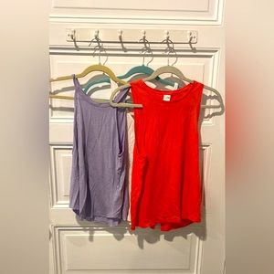 Three Summer Tanks in purple, red/pink and white.